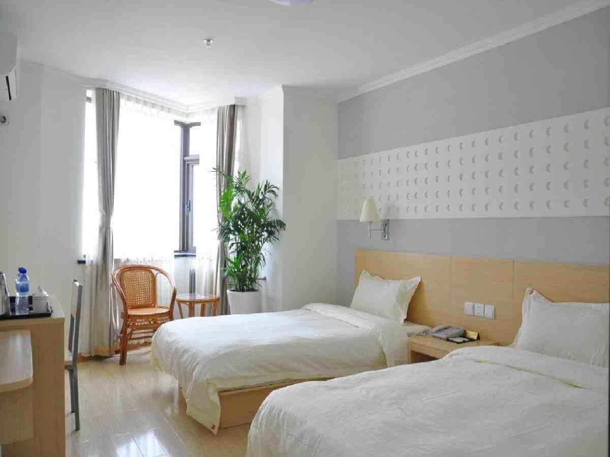 Super 8 Hotel Qingdao Railway Station Gui Zhou Road Bagian luar foto