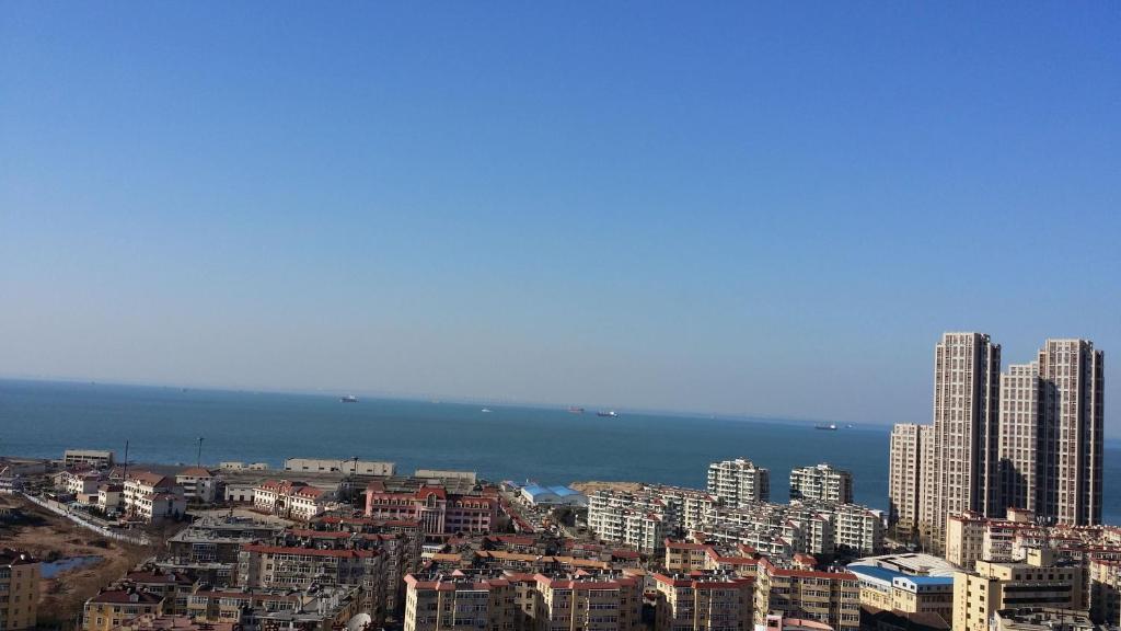Super 8 Hotel Qingdao Railway Station Gui Zhou Road Bagian luar foto